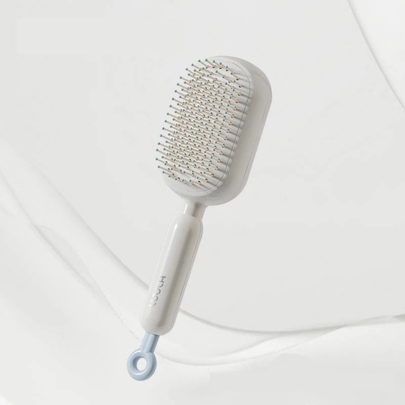 Peigne à cheveux rétractable